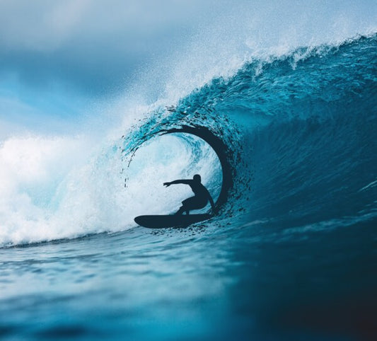 Surfer on Blue Waves